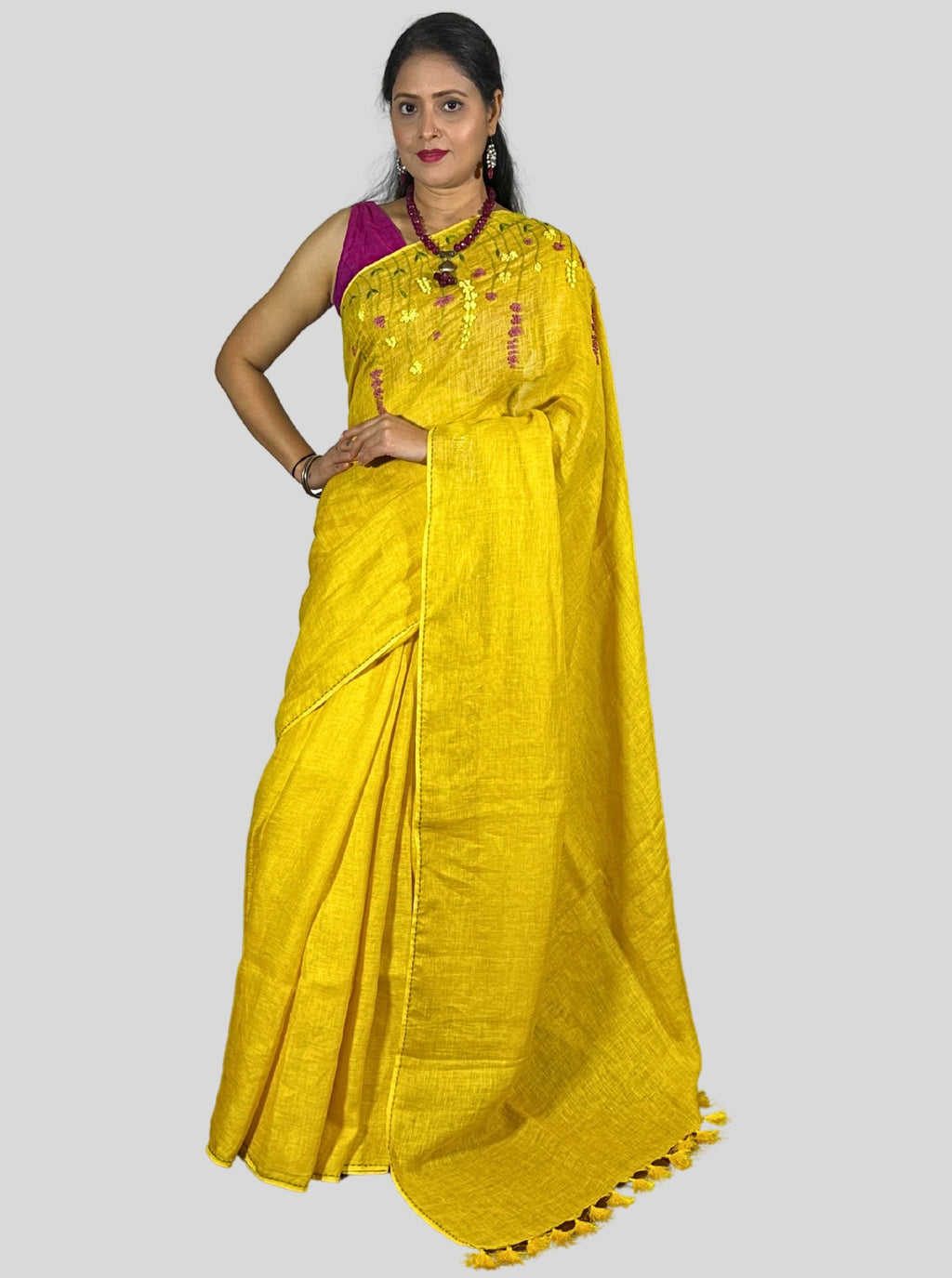 mango yellow handloom linen saree with hand embroiedry and attached blouse
