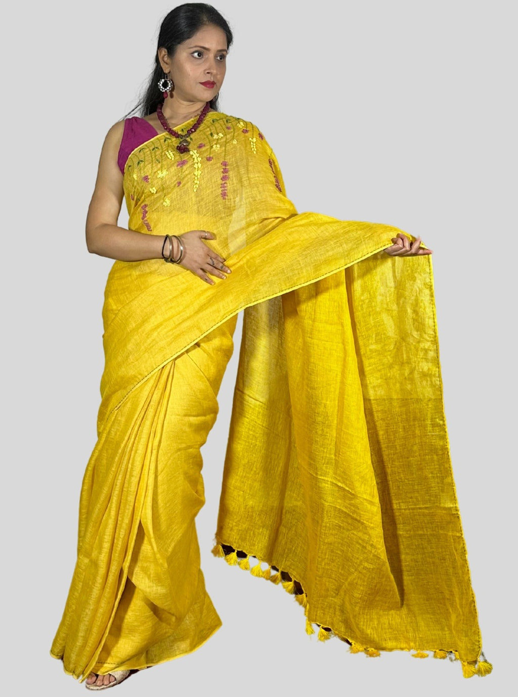 mango yellow handloom linen saree with hand embroiedry and attached blouse