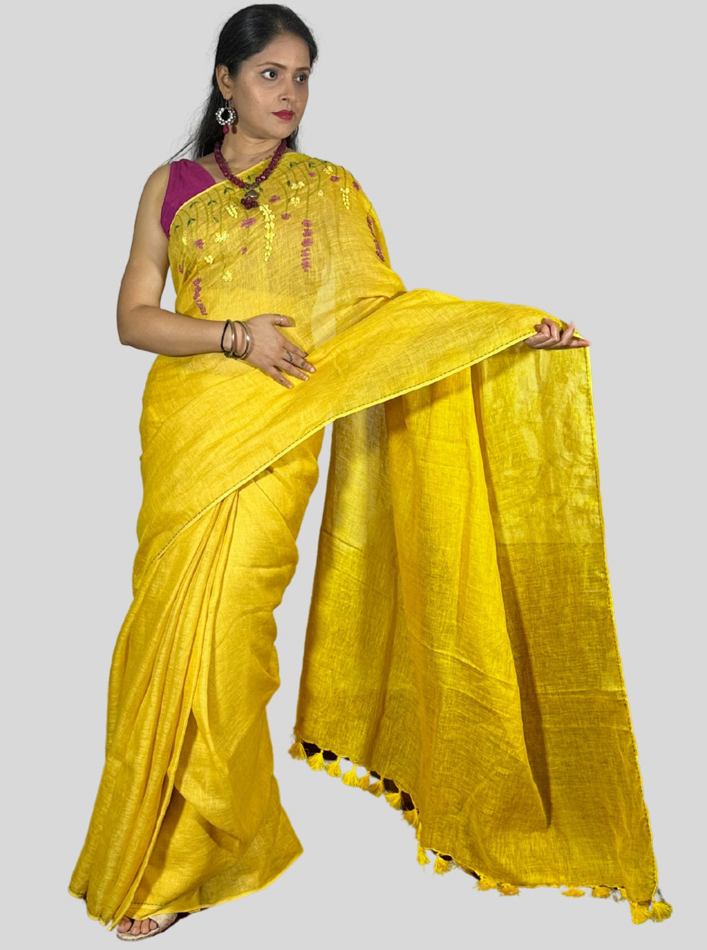 mango yellow handloom linen saree with hand embroiedry and attached blouse