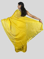 mango yellow handloom linen saree with hand embroiedry and attached blouse