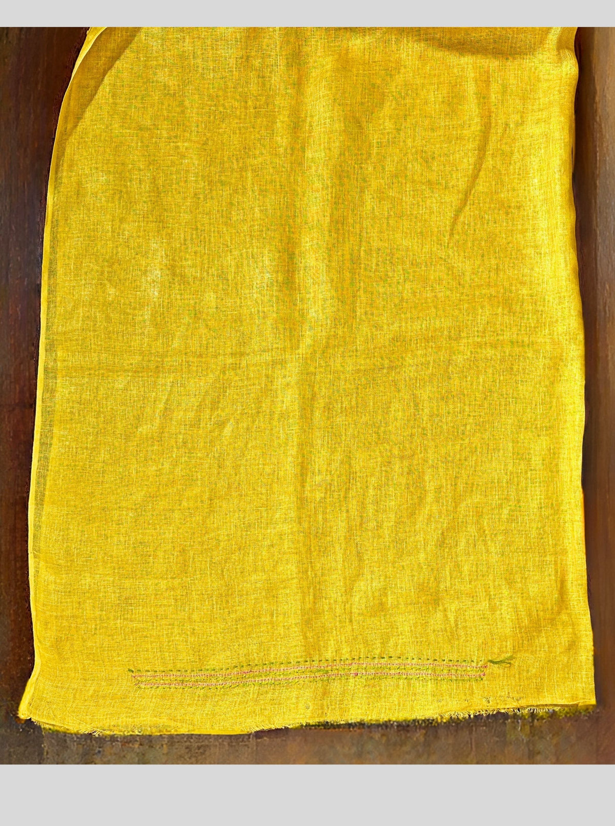 mango yellow handloom linen saree with hand embroiedry and attached blouse