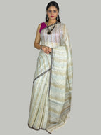 Beige handloom linen saree with silver tissue stripes with blouse