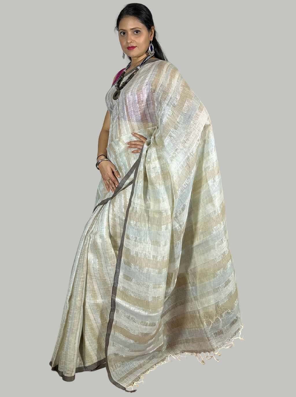 Beige handloom linen saree with silver tissue stripes with blouse
