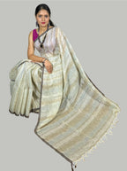 Beige handloom linen saree with silver tissue stripes with blouse