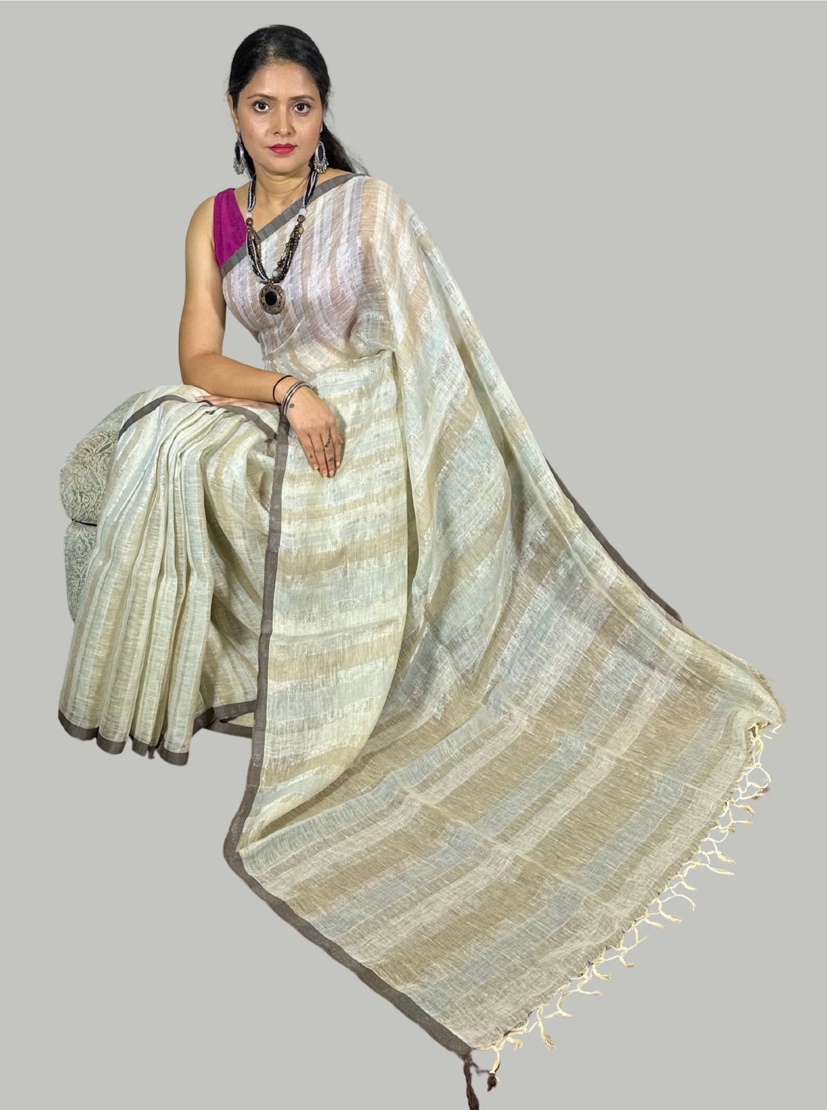 Beige handloom linen saree with silver tissue stripes with blouse